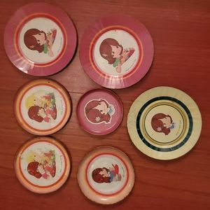 7 Vintage metal toy plates. Usual wear for older toy.